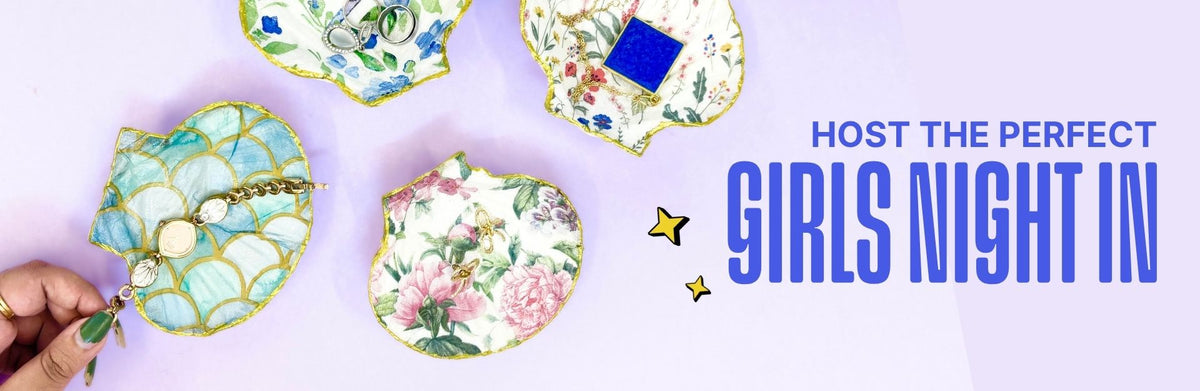 Host the perfect girls night in - hand-decorated shell trinket dishes holding rings and jewelry